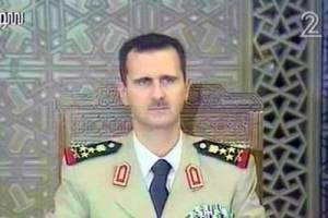  Президент Сирии Башар Асад в форме главнокомандующего сирийской армии	 Фото: кадр сирийского ТВ, переданный 2 каналом ИТВ, архив