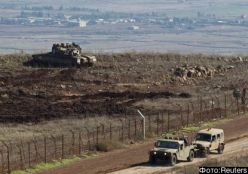 A tank stands in position close to the ceasefire line between Israel and Syria on the Israeli-occupied Golan Heights