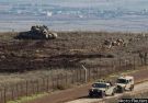 A tank stands in position close to the ceasefire line between Israel and Syria on the Israeli-occupied Golan Heights